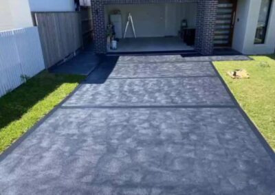 coloured concrete driveway at new house in Numurkah VIC