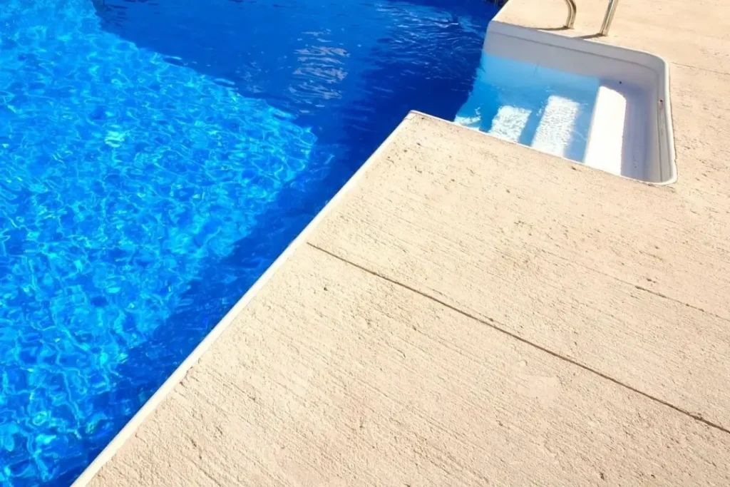 broom-finish concrete pool surround