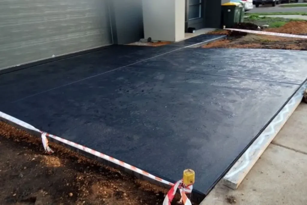 freshly poured concrete driveway