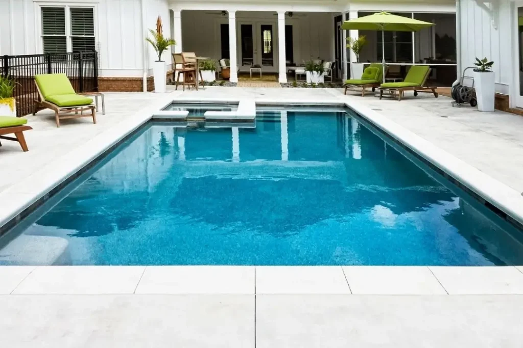 light coloured concrete pool surround