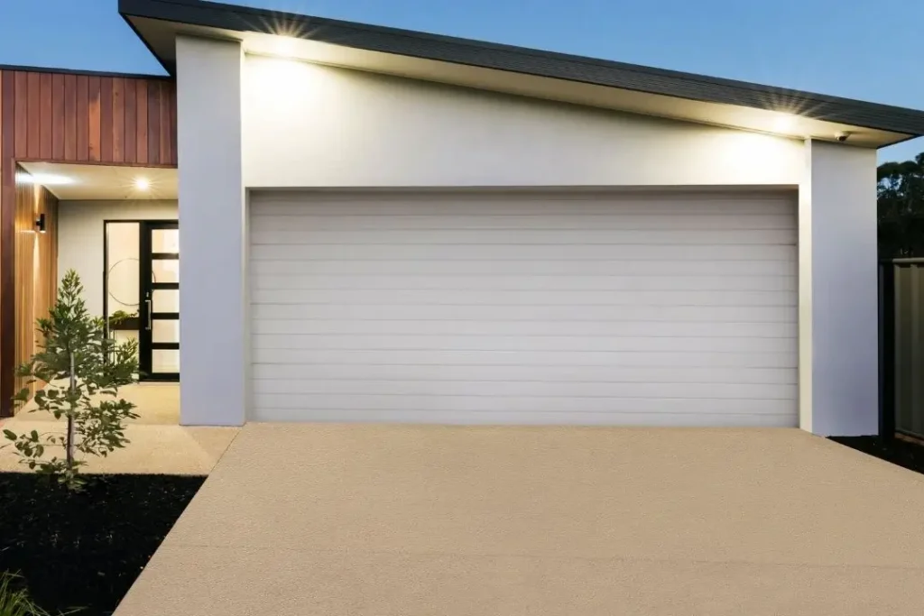 property with a coloured concrete driveway